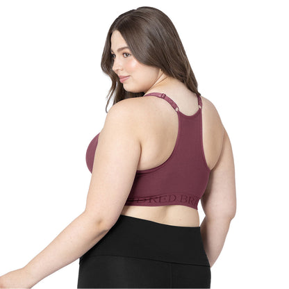 Back view of a model wearing the Sublime® Hands-Free Pumping & Nursing Sports Bra in Fig/