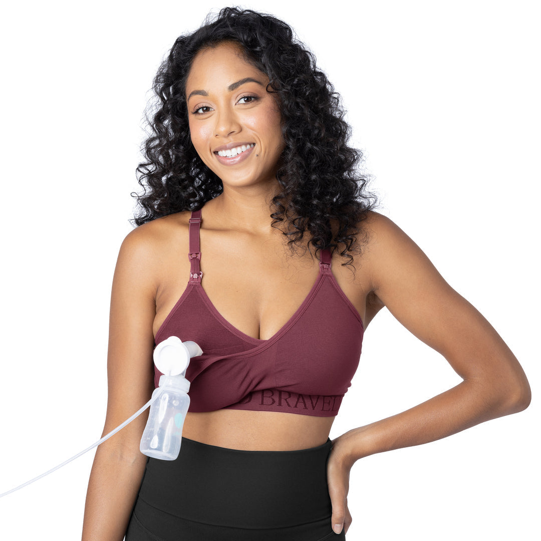 Model hooked up to a pump while wearing the Sublime® Hands-Free Pumping & Nursing Sports Bra in Fig.