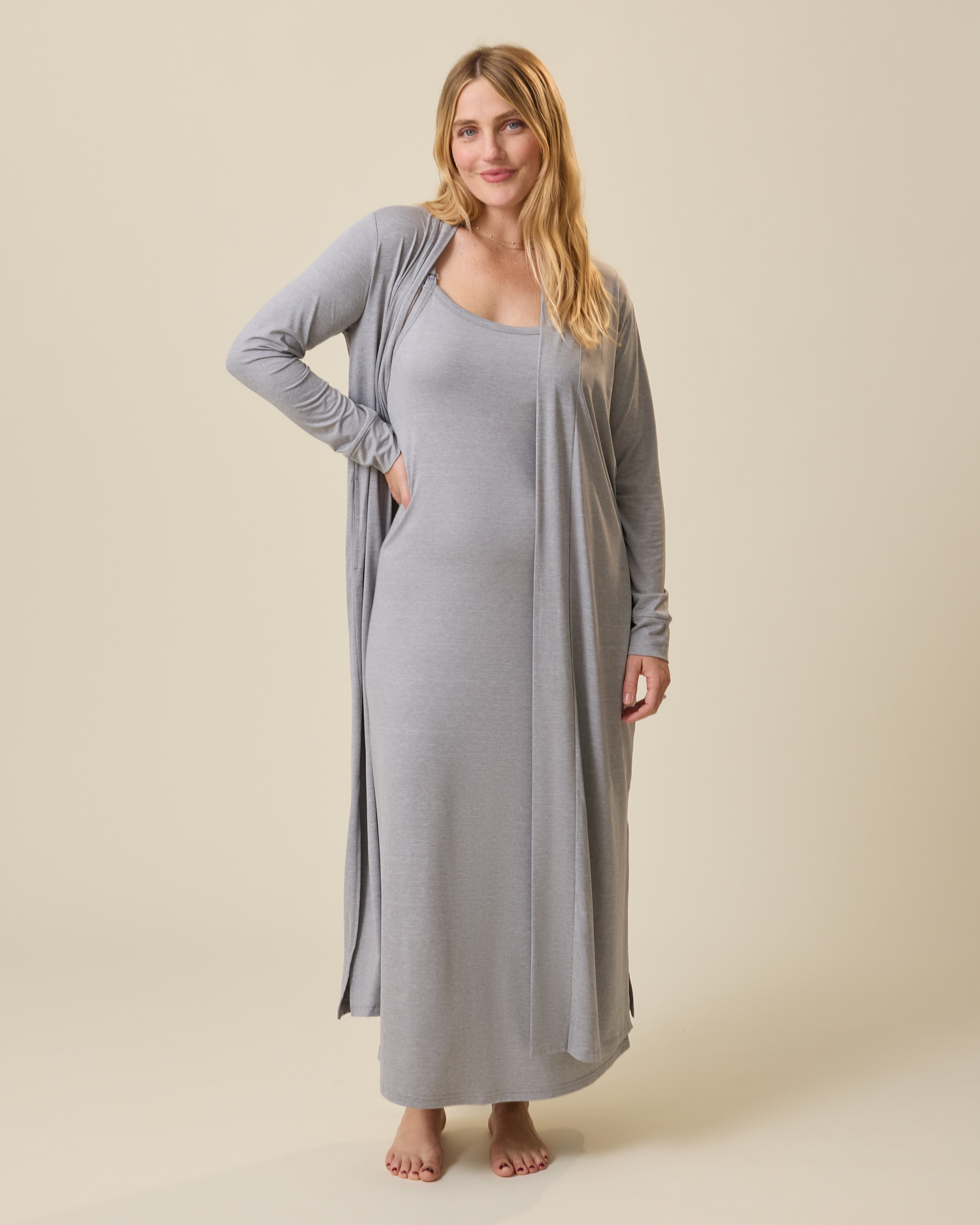 Woman wearing a long long grey lounge dress and duster @model_info:Lauren is 5'8" and wearing a Medium.