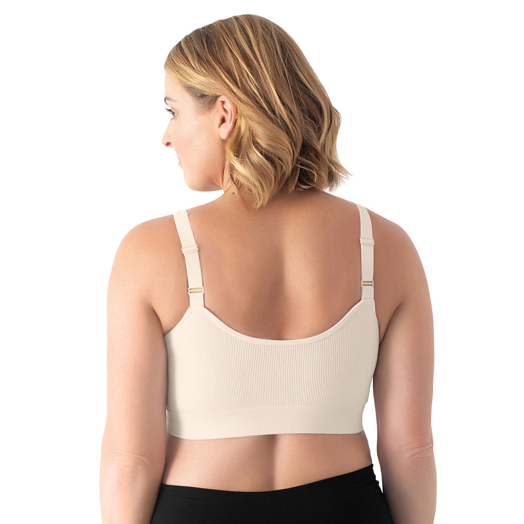 Back of a model wearing the Grace Ribbed Lounge Bra in Stone.