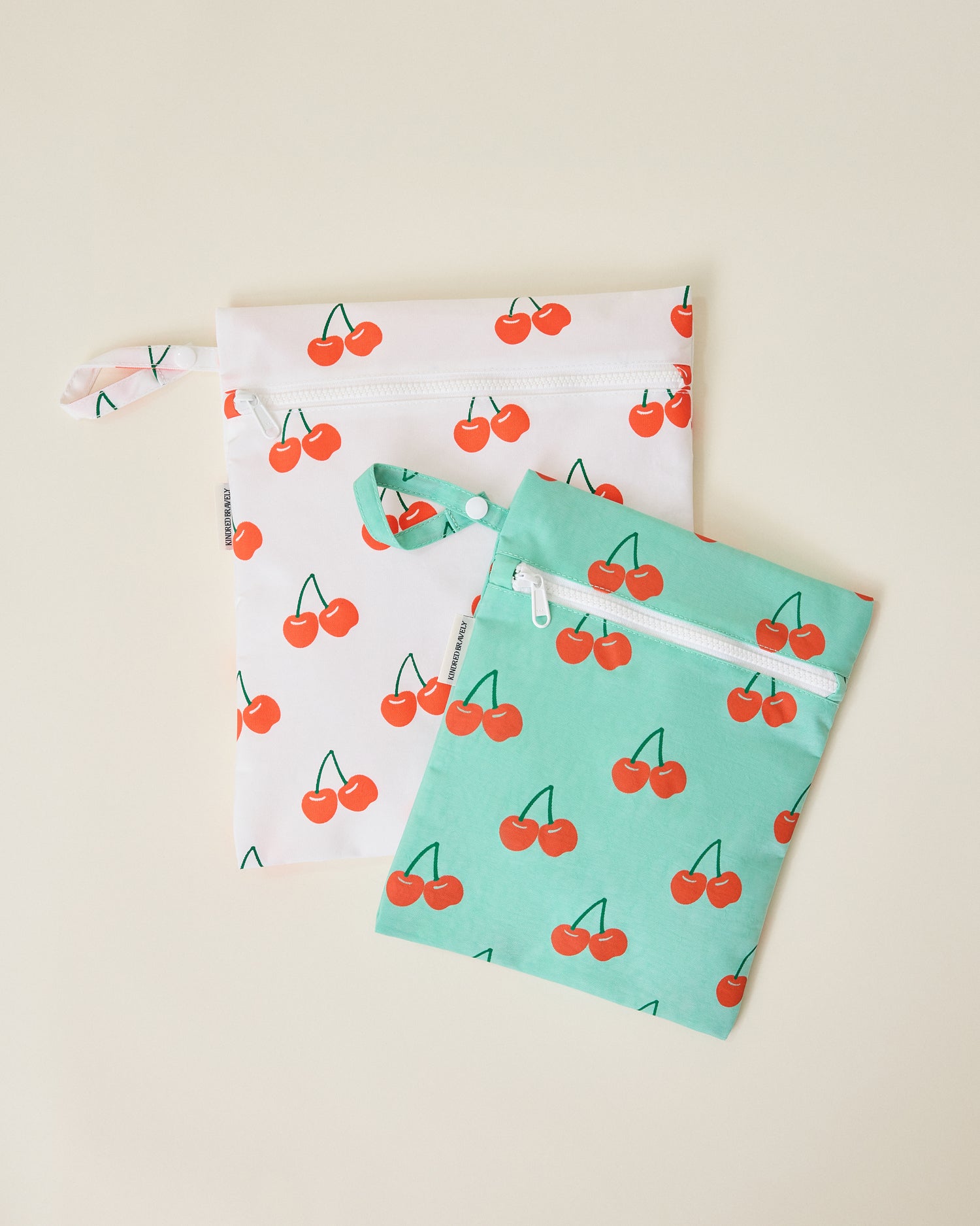 Wet/Dry Bag Set in Cherries print on beige background