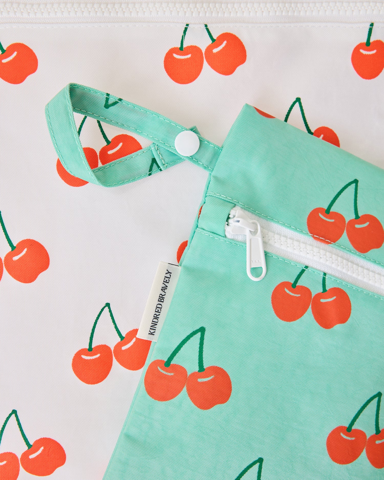 Close up of Wet/Dry Bag Set in Cherries print