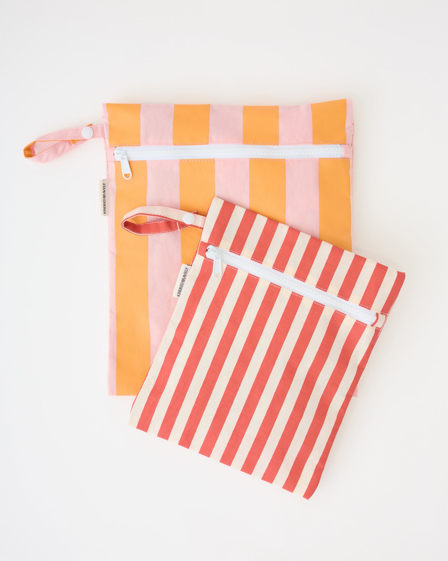 Wet/Dry Bag Set in Pink Stripe on a beige background