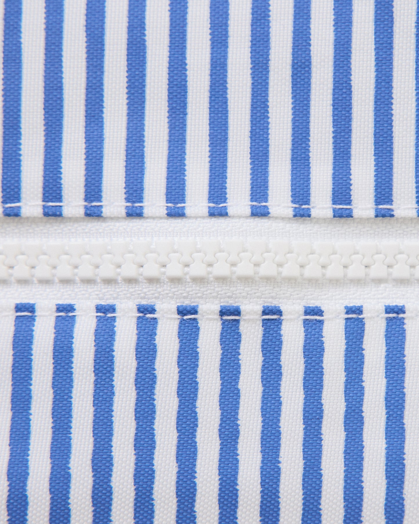 Close up of thin blue stripe bag of Wet/Dry Bag Set in Stripe print