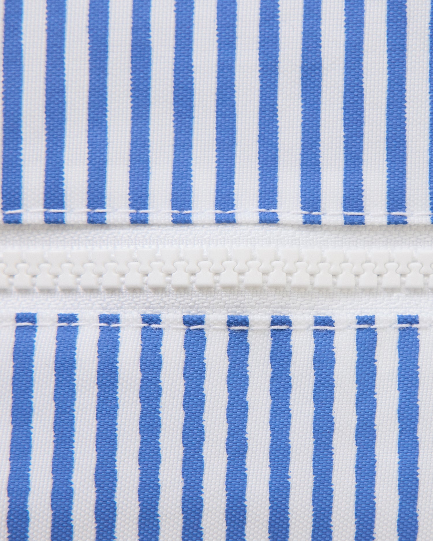Close up of thin blue stripe bag of Wet/Dry Bag Set in Stripe print