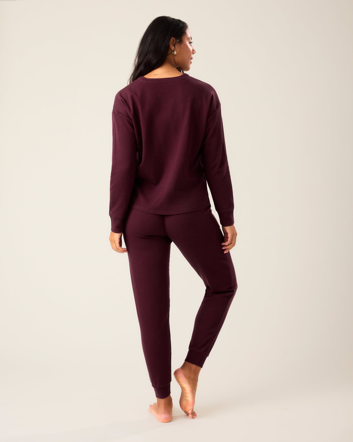 Back of woman wearing the Waffle Maternity & Nursing Lounge Set in deep burgundy 