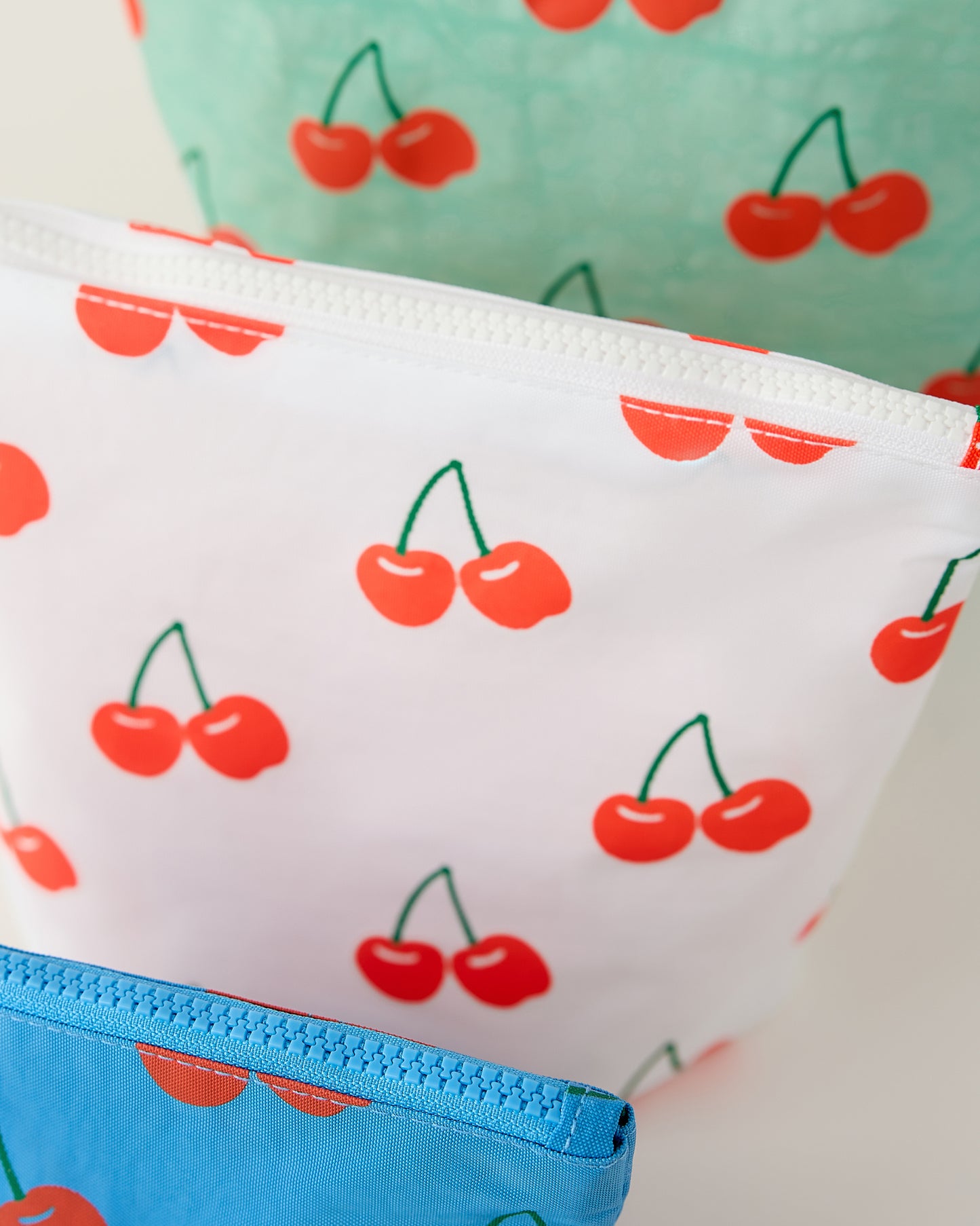 Pouches with cherry pattern on a white background