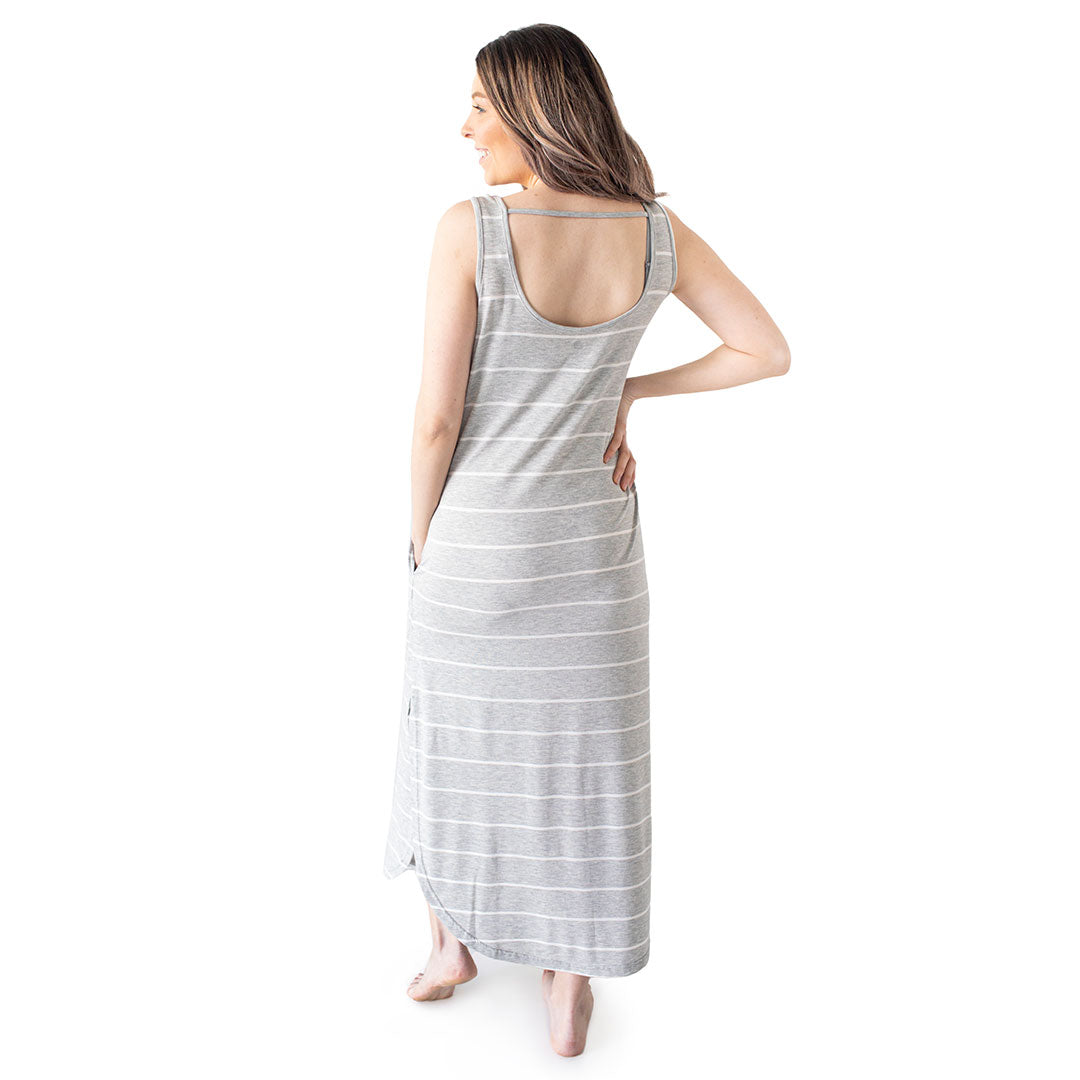Back view of a model wearing the Zora Maternity & Nursing Maxi Dress in Grey Heather