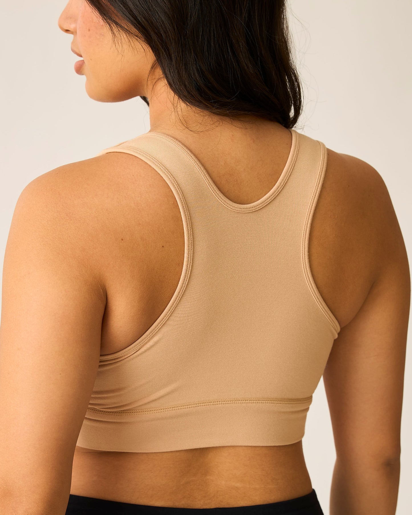 Back view of model wearing French Terry bra beige