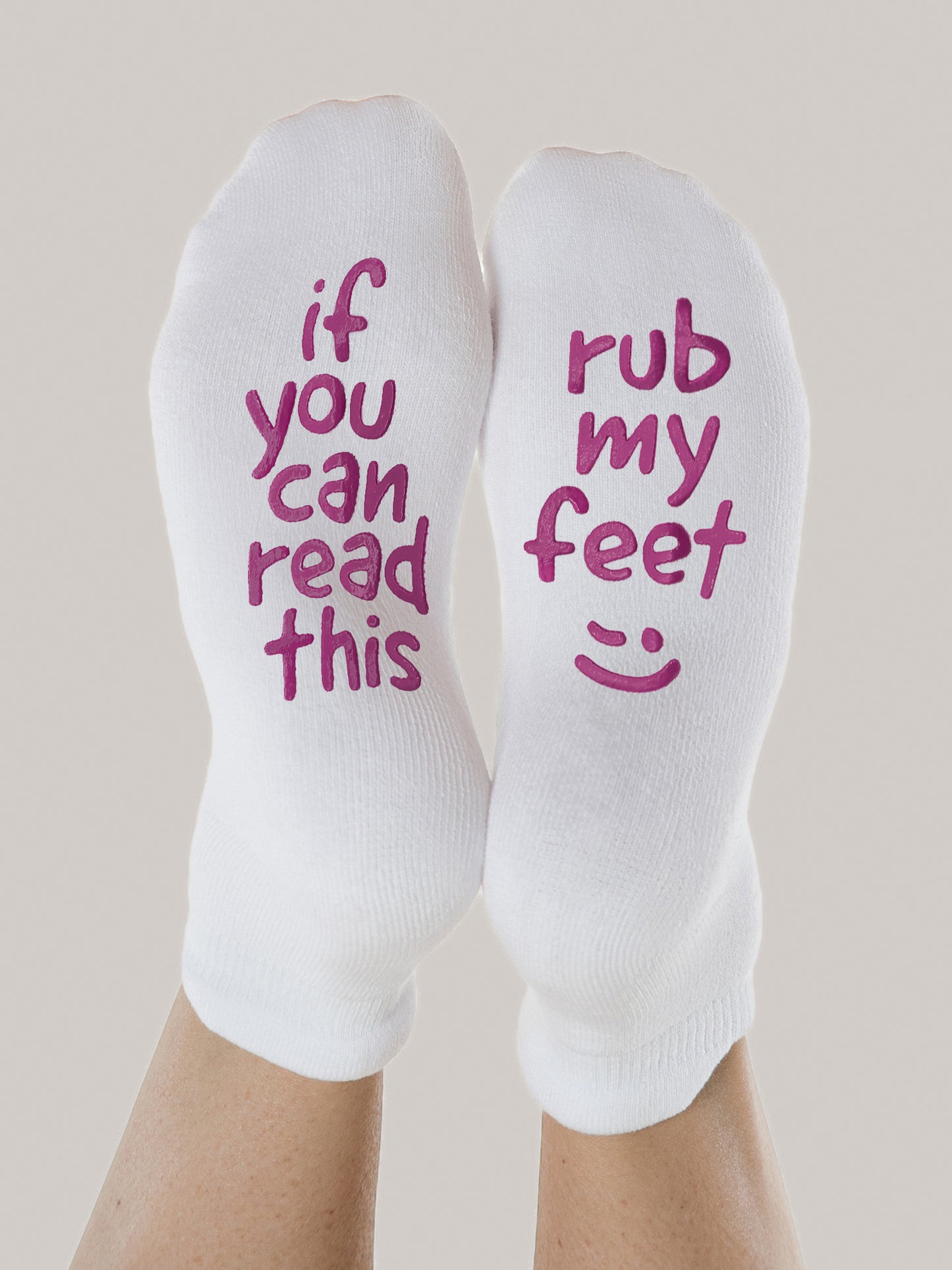 Rub My Feet Labor & Delivery socks shown on model
