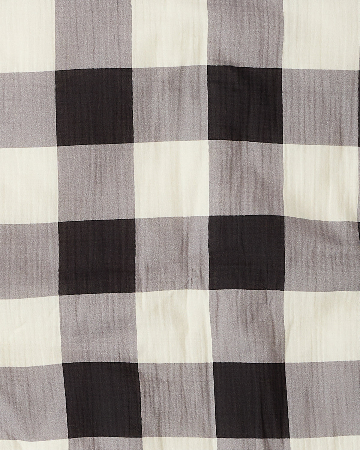 Close up of soft material of the Cozy Stroller Blanket in Buffalo Plaid.