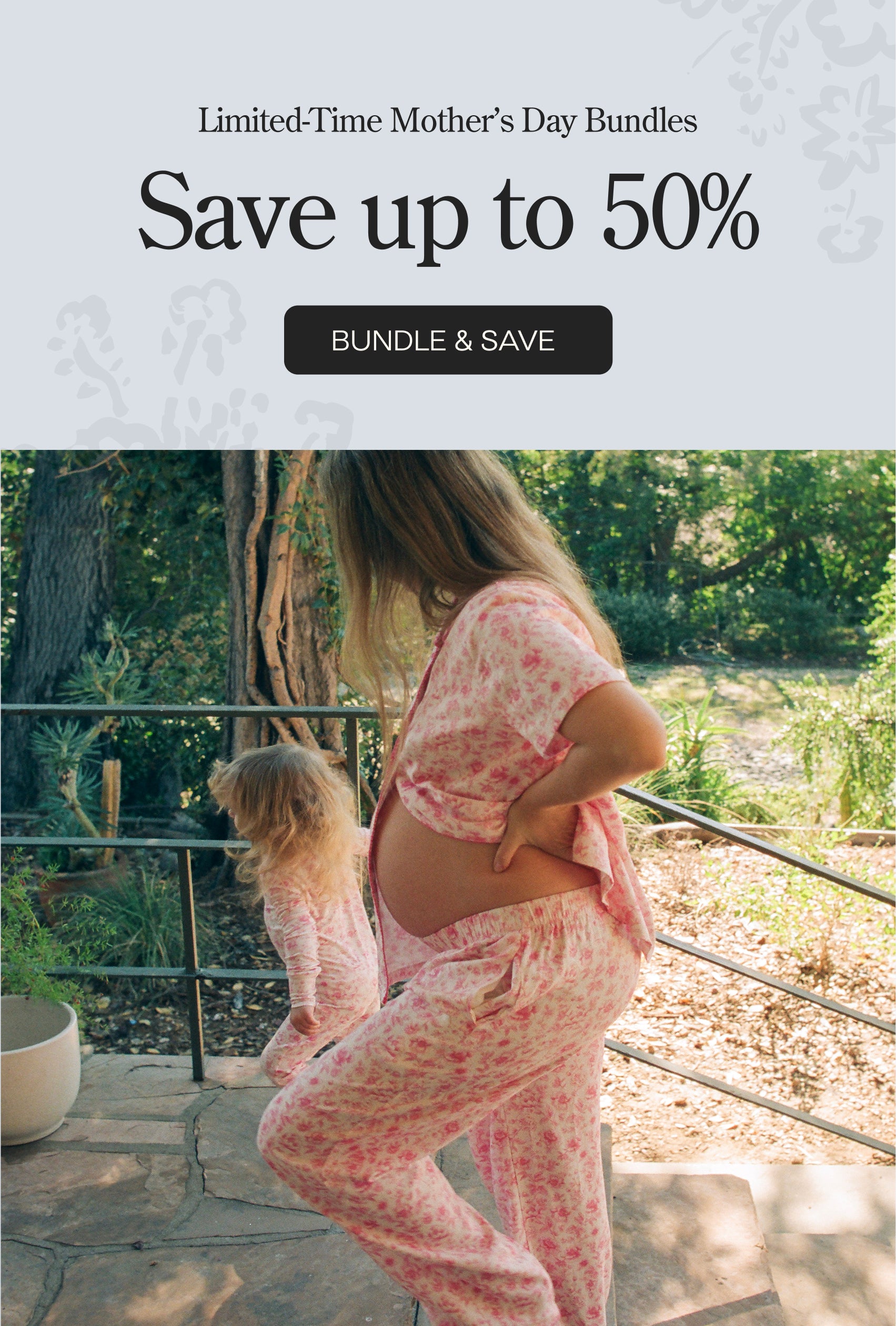 Promotional graphic for Mother's Day bundles. Black text on white background. Limited-Time Mother's Day Bundles. Save up to 50%. Black button: Bundle & Save. Image of pregnant mother, Kate Caruso, and her daughter walking through their lush yard in matching Pink Toile pajamas.