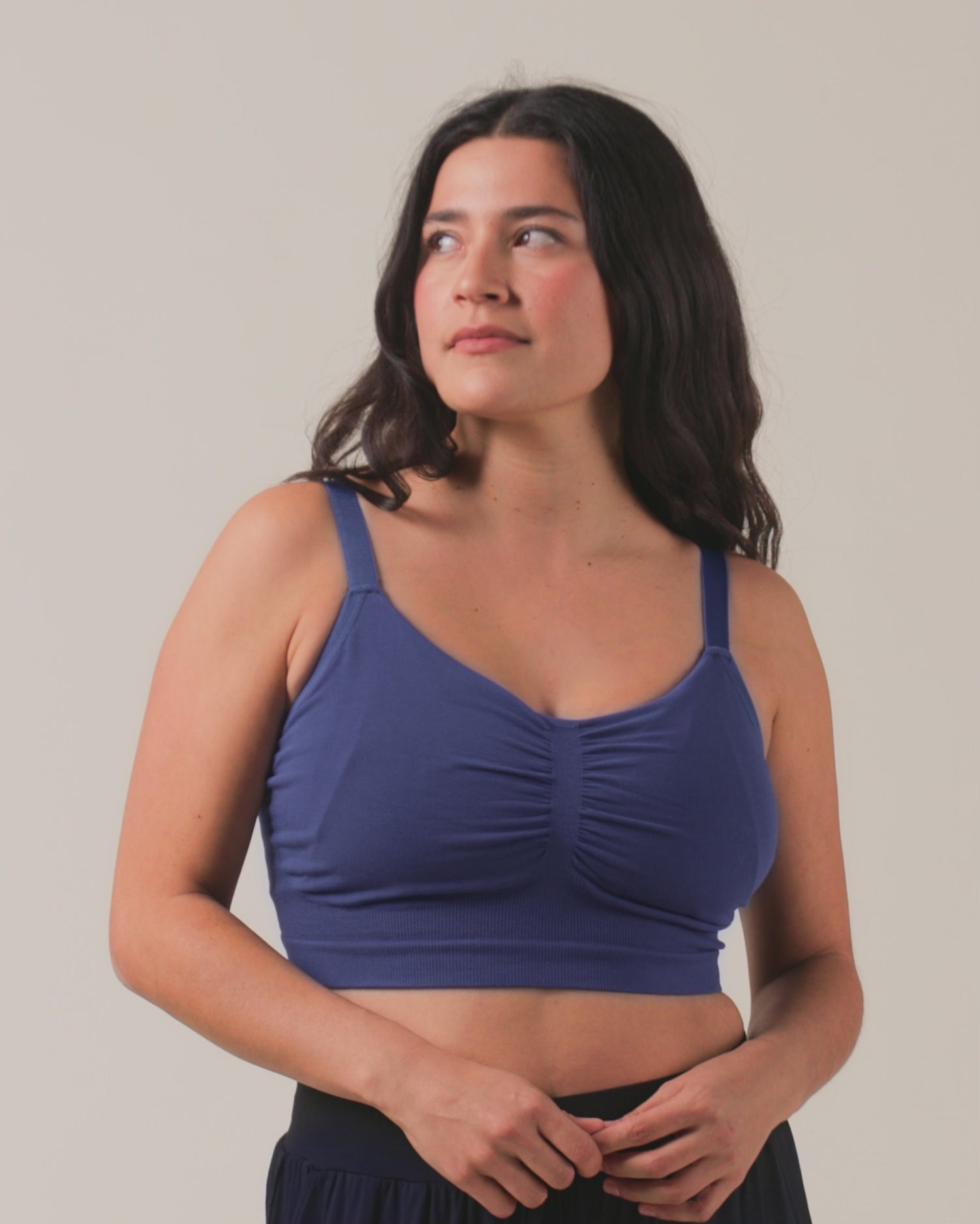 Video of model wearing Sublime Bamboo Hands-Free Pumping Lounge & Sleep Bra on a neutral background
