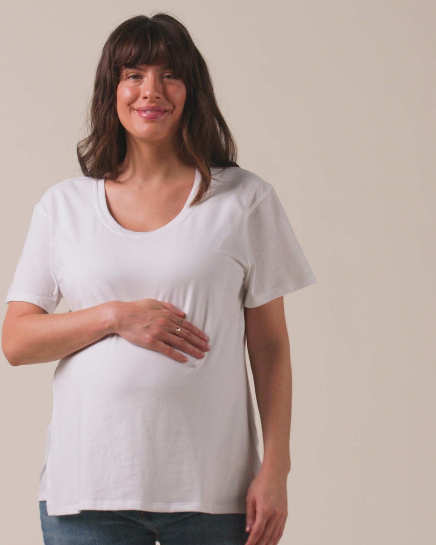 Video of model wearing Relaxed Cotton Maternity & Nursing T-shirt in White with a neutral background