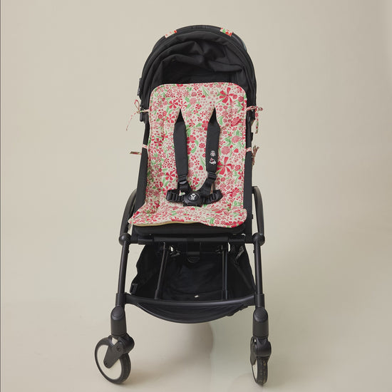 Video for the Stroller Party Set with Seat Liner, Party Clips and Caddy Bag in Superbloom floral pattern on a beige background