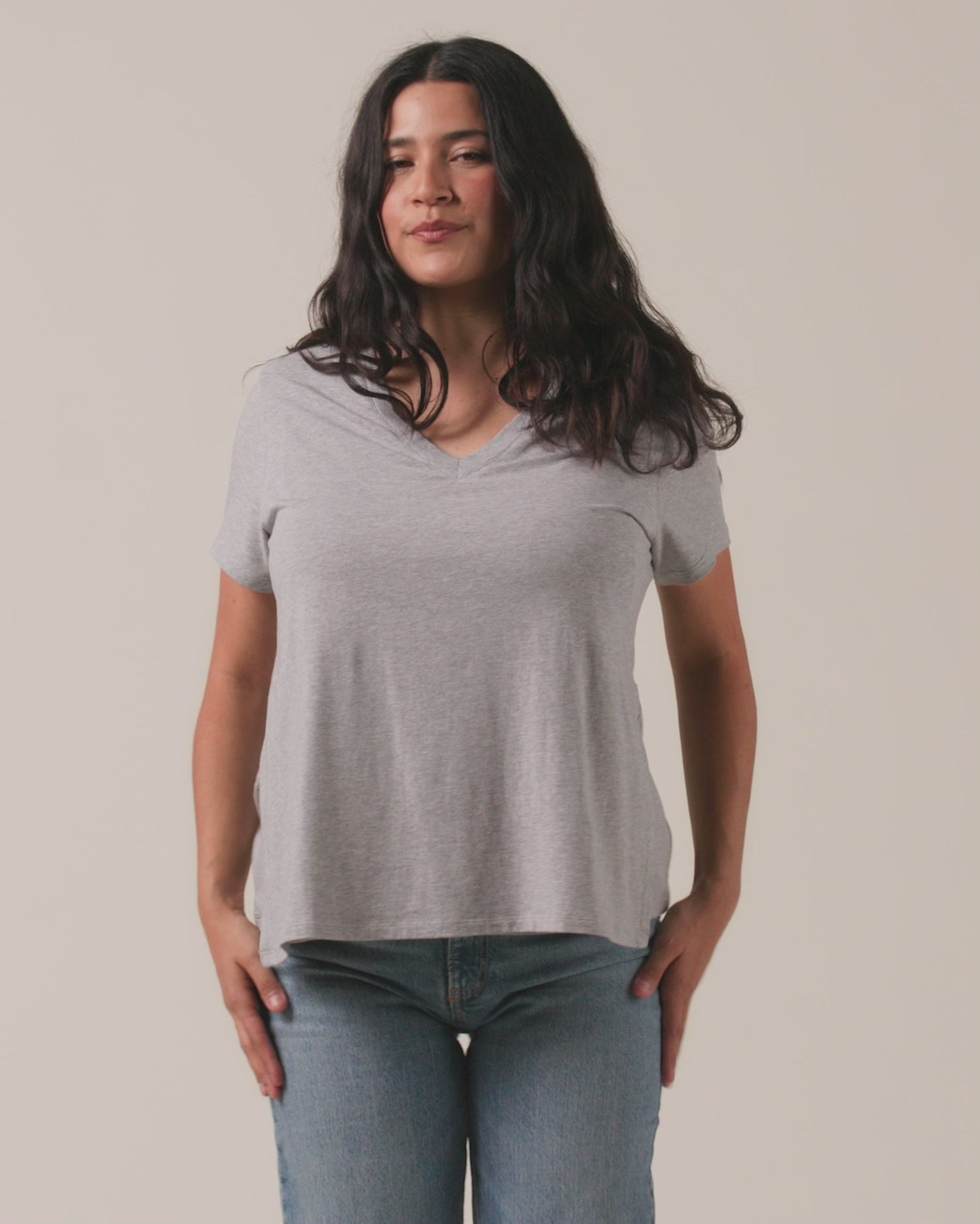 Vide of model wearing Classic Modal V-neck Nursing T-shirt in Grey Heather with a neutral background