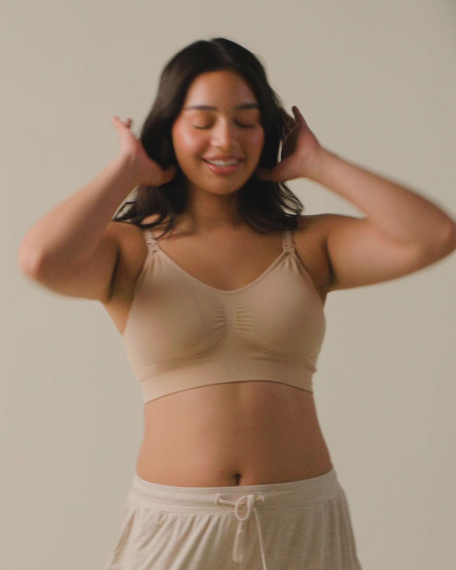 Video of model wearing Simply Sublime Nursing Bra on a neutral background