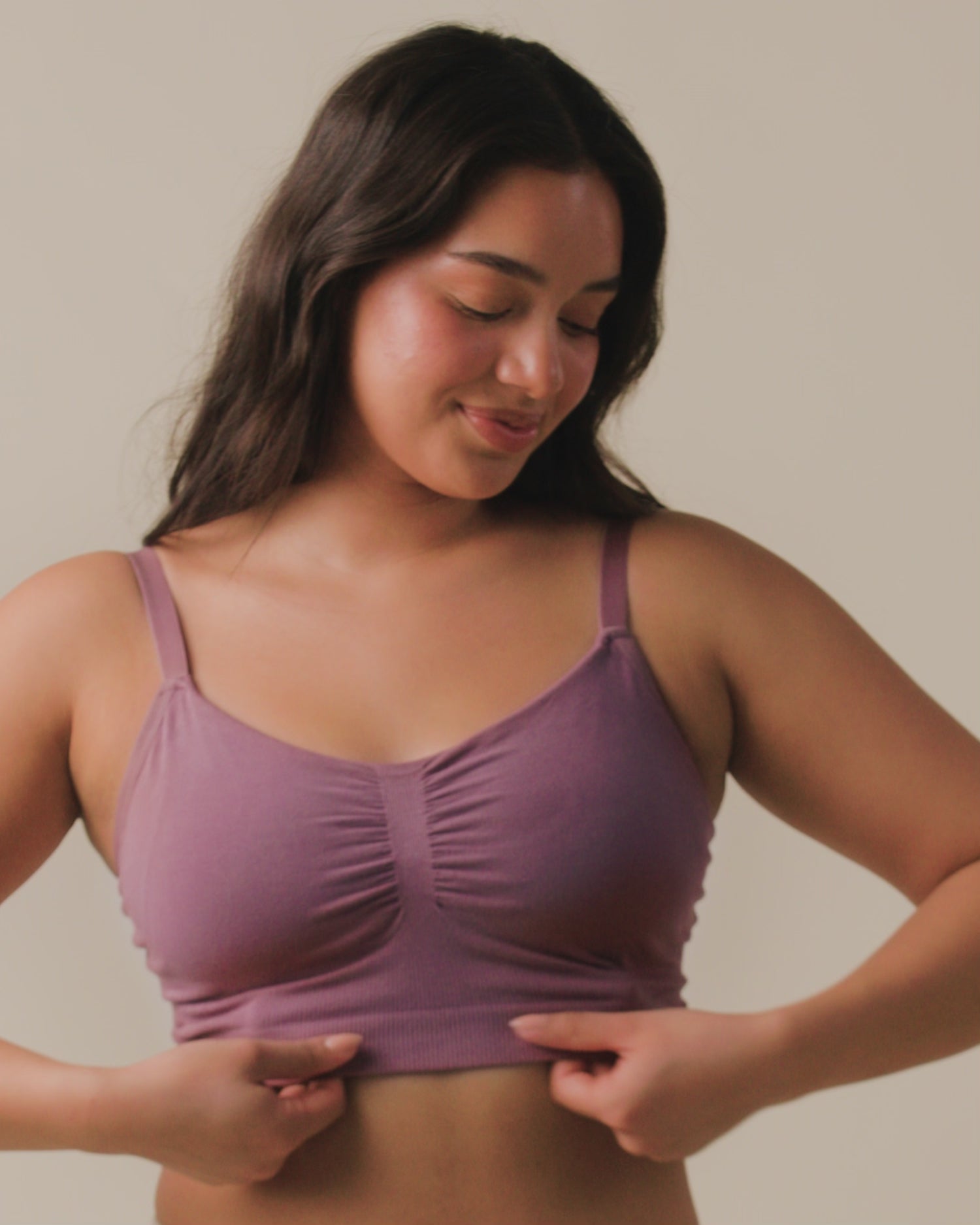 Video of model wearing Sublime Bamboo Hands-Free Pumping Lounge & Sleep Bra on a neutral background