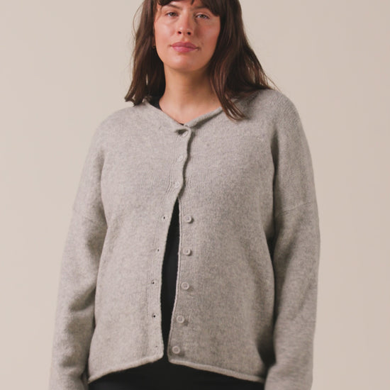 Video of model wearing Ultra Soft Maternity & Postpartum Cardigan on a neutral background