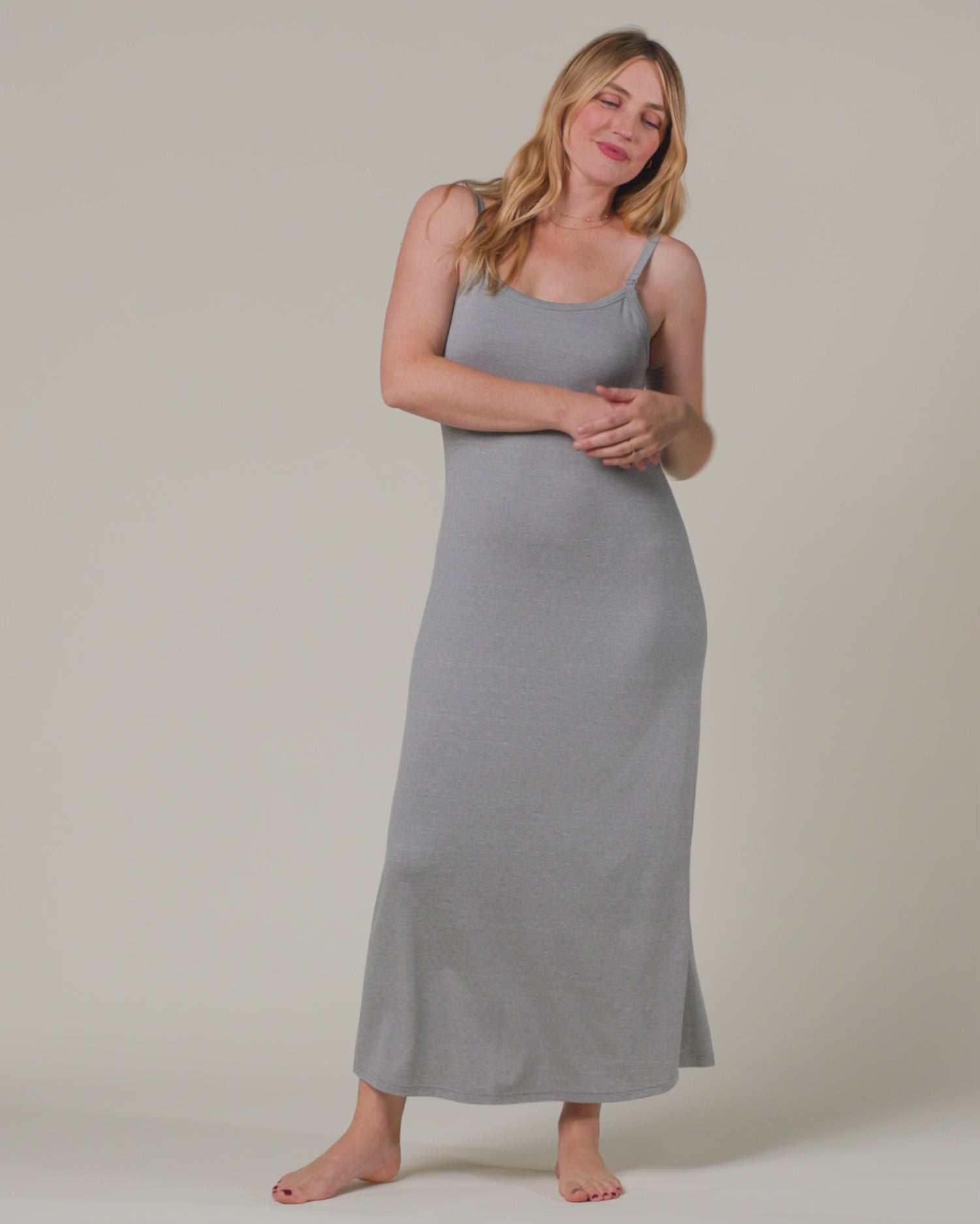 Video of model wearing the Sunday Maternity & Nursing Lounge Dress on a neutral background