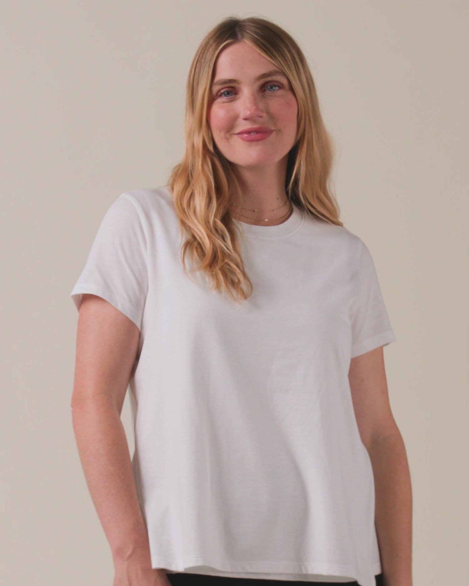 Front view of model wearing Classic Cotton Nursing T-shirt in White on a neutral background