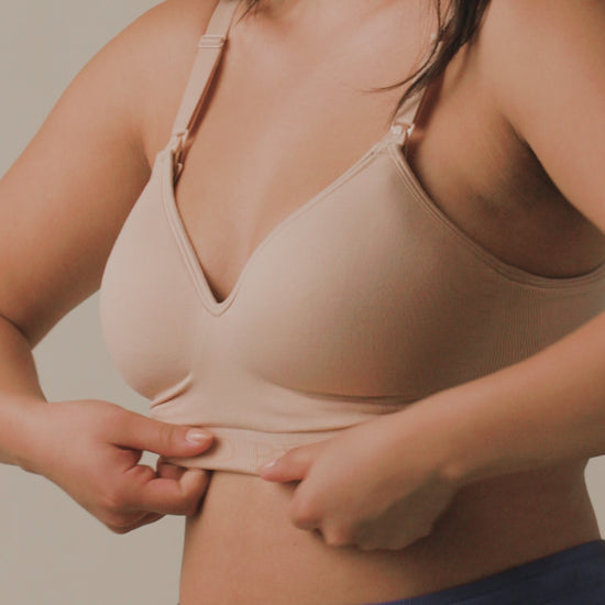 Video of model wearing Signature Sublime Contour Hands-Free Pumping & Nursing Bra showing how it unclips at the front