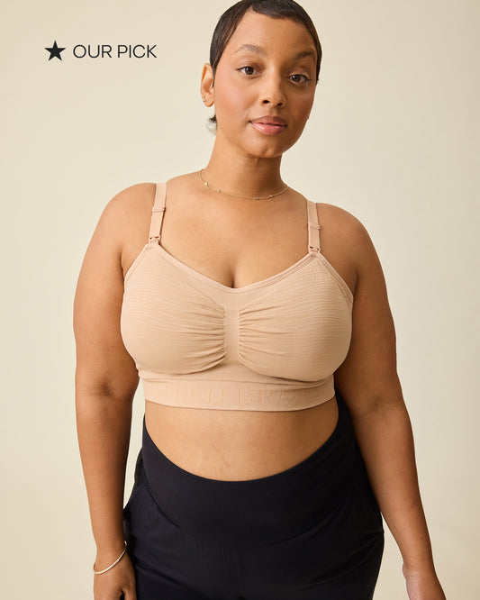 Black star and words, Our Pick over beige background. Model is wearing Sublime® Hands-Free Pumping & Nursing Bra in beige and Bamboo Wide Leg Maternity & Postpartum Lounge Pant in Black on a beige background.