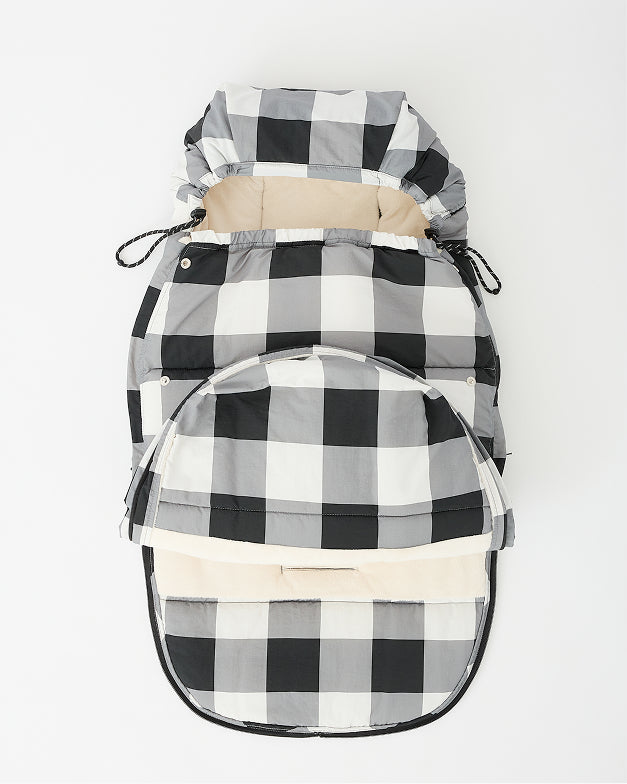 Cozy Stroller Footmuff in Buffalo Plaid with foot unzipped and open, on an off white background.