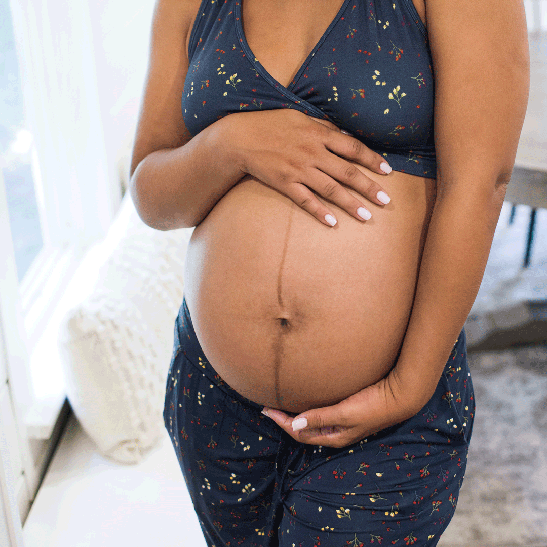 Pregnant model wearing the Everyday Lounge Jogger in Winter Bloom 